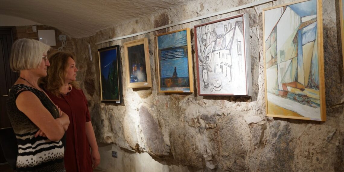 Marijampolės krašto ir Prezidento Kazio Griniaus muziejaus rūsyje atidaryta paroda „Miestas dailininkų akimis“